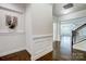 Elegant foyer featuring hardwood floors and a view into the living room at 5021 Henshaw Rd, Waxhaw, NC 28173