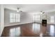Bright and spacious living area with hardwood floors and fireplace at 5021 Henshaw Rd, Waxhaw, NC 28173