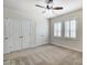 Bright bedroom with double doors and carpet at 5021 Henshaw Rd, Waxhaw, NC 28173