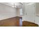 Formal dining room with hardwood floors, chair railing, and chandelier at 5021 Henshaw Rd, Waxhaw, NC 28173