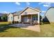 Tan house exterior with brick steps and patio at 5021 Henshaw Rd, Waxhaw, NC 28173