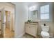 Well-appointed bathroom with granite countertop and updated fixtures at 5021 Henshaw Rd, Waxhaw, NC 28173