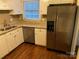 Modern kitchen with stainless steel appliances and granite counters at 614 Kenlough Dr, Charlotte, NC 28209