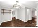 Dining room with wood-look floors, a light fixture, and doorways leading to other rooms at 139 Ebenezer Ave, Rock Hill, SC 29730