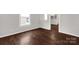 Empty room with dark wood-look flooring and white trim at 139 Ebenezer Ave, Rock Hill, SC 29730
