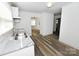 Kitchen with granite countertops and stainless steel sink at 125 S Ervin Ave, Newton, NC 28658