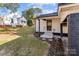 House exterior showcasing a side entrance and landscaping at 710 Packard Ave, Kannapolis, NC 28083