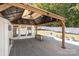 Covered deck with pergola, providing a shaded outdoor space at 6859 Lakecrest Ct, Denver, NC 28037