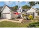Two-story house with attached garage and patio at 6859 Lakecrest Ct, Denver, NC 28037