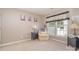 Relaxing sitting area with a comfy chair and natural light at 6859 Lakecrest Ct, Denver, NC 28037