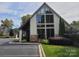 Modern clubhouse with large windows and stone accents at 6859 Lakecrest Ct, Denver, NC 28037