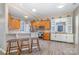 Modern kitchen with granite countertops and wooden cabinets at 6859 Lakecrest Ct, Denver, NC 28037