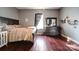 Bedroom with hardwood floors and a patterned bedspread at 103 Brent St, Wadesboro, NC 28170