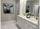 Elegant bathroom with double vanity, marble flooring, and a frameless glass shower at 1044 Bull Dog Ln, Wingate, NC 28174
