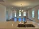 Kitchen features a large island with double sink and an open floor plan at 1044 Bull Dog Ln, Wingate, NC 28174