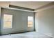 Bright bedroom with two windows offering natural light at 1053 Bull Dog Ln, Wingate, NC 28174