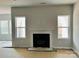 Simple fireplace in a living room with white mantel at 1053 Bull Dog Ln # 15, Wingate, NC 28174