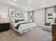 Spacious main bedroom with plush carpet and large windows at 1053 Bull Dog Ln, Wingate, NC 28174