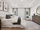 Bright main bedroom featuring a sitting area and ample natural light at 1053 Bull Dog Ln, Wingate, NC 28174