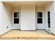 Covered patio with concrete flooring and exterior access at 1053 Bull Dog Ln, Wingate, NC 28174