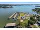 Aerial view of lakefront property with marina and boat slips at 309 Commodore Loop, Mooresville, NC 28117
