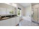 Bathroom boasts double vanity and soaking tub at 309 Commodore Loop, Mooresville, NC 28117
