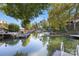 Calm water view with boats and docks on a sunny day at 309 Commodore Loop, Mooresville, NC 28117