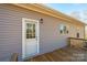 Rear view of the house, showcasing a back door and deck at 445 32Nd Sw St, Hickory, NC 28602