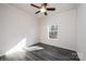 Spacious bedroom with grey flooring and a window at 507 32Nd Sw St, Hickory, NC 28602