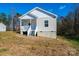 Single-story home with front porch and vinyl siding at 507 32Nd Sw St, Hickory, NC 28602