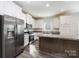 Modern kitchen with stainless steel appliances and an island at 507 32Nd Sw St, Hickory, NC 28602