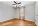 Bedroom with wood floors and window coverings at 2505 Bass Ct, Harrisburg, NC 28075