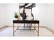 Bright home office features a modern desk, comfortable chair, and stylish decor at 8946 Glencroft Rd, Mint Hill, NC 28227