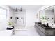 Spa-like bathroom featuring double sinks, a large mirror, and a walk-in shower at 8946 Glencroft Rd, Mint Hill, NC 28227