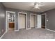 Bright bedroom featuring ample closet space and bathroom access at 1100 Black Walnut Dr, Hickory, NC 28602