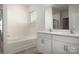 Bathroom with double vanity, soaking tub, and shower at 126 Flame Azalea Ct, Locust, NC 28097