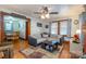 Cozy living room with sectional sofa, coffee table, and brick fireplace at 710 Wood St, Statesville, NC 28677