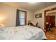 Bedroom with a double bed, window, and adjacent office space at 710 Wood St, Statesville, NC 28677