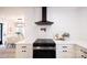 Modern kitchen with white cabinets, stainless steel appliances, and white tile backsplash at 8946 Glencroft Rd, Mint Hill, NC 28227