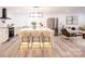 Modern kitchen with large island, stainless steel appliances, and white cabinetry at 8946 Glencroft Rd, Mint Hill, NC 28227