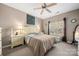 Bright bedroom with a queen-size bed, dresser, and plenty of natural light at 11923 Ridgeway Park Dr, Charlotte, NC 28277