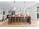 Modern kitchen with island and hardwood floors at 217 Keswick Ave, Charlotte, NC 28206