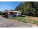 Brick house with a spacious yard and chain link fence at 3540 Highway 324 Hwy, Rock Hill, SC 29732