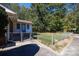 Brick house with a spacious yard and chain link fence at 3540 Highway 324 Hwy, Rock Hill, SC 29732