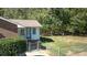 Private backyard with a chain link fence and trees at 3540 Highway 324 Hwy, Rock Hill, SC 29732