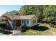 Brick house with a spacious yard and chain link fence at 3540 Highway 324 Hwy, Rock Hill, SC 29732