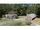 Aerial view of house and detached garage on a wooded lot at 3540 Highway 324 Hwy, Rock Hill, SC 29732