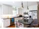 Modern kitchen featuring white cabinets, granite countertops and an island at 3540 Highway 324 Hwy, Rock Hill, SC 29732