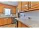 Kitchen boasts ample counter space and oak cabinetry at 5076 Nc Hwy 127 Hwy, Taylorsville, NC 28681