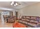 Spacious living room with leather furniture and hardwood floors at 5076 Nc Hwy 127 Hwy, Taylorsville, NC 28681